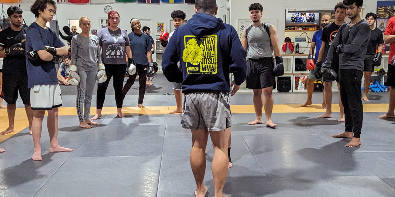 SBG Scarborough Muay Thai class group photo — striking program at 489 Brimley Rd, Scarborough